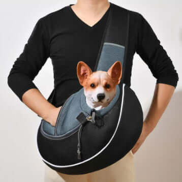 Carrying Pets Bag Outdoor Cross body Bag For Dogs and Cats with a happy dog peeking out from the bag.