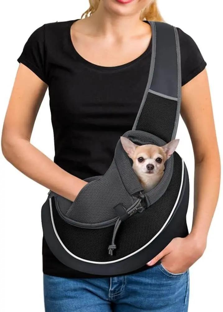 Carrying Pets Bag Outdoor Cross body Bag for Dogs and Cats, featuring a comfortable design with a small dog inside.